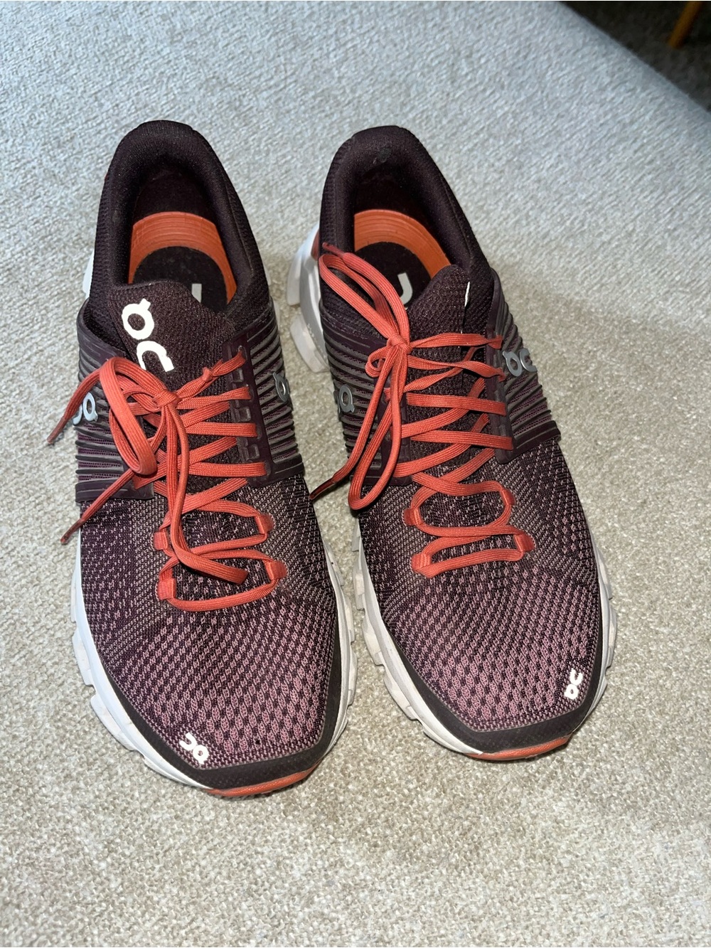 On Running Women's Running Shoes in Burgundy with Red Laces